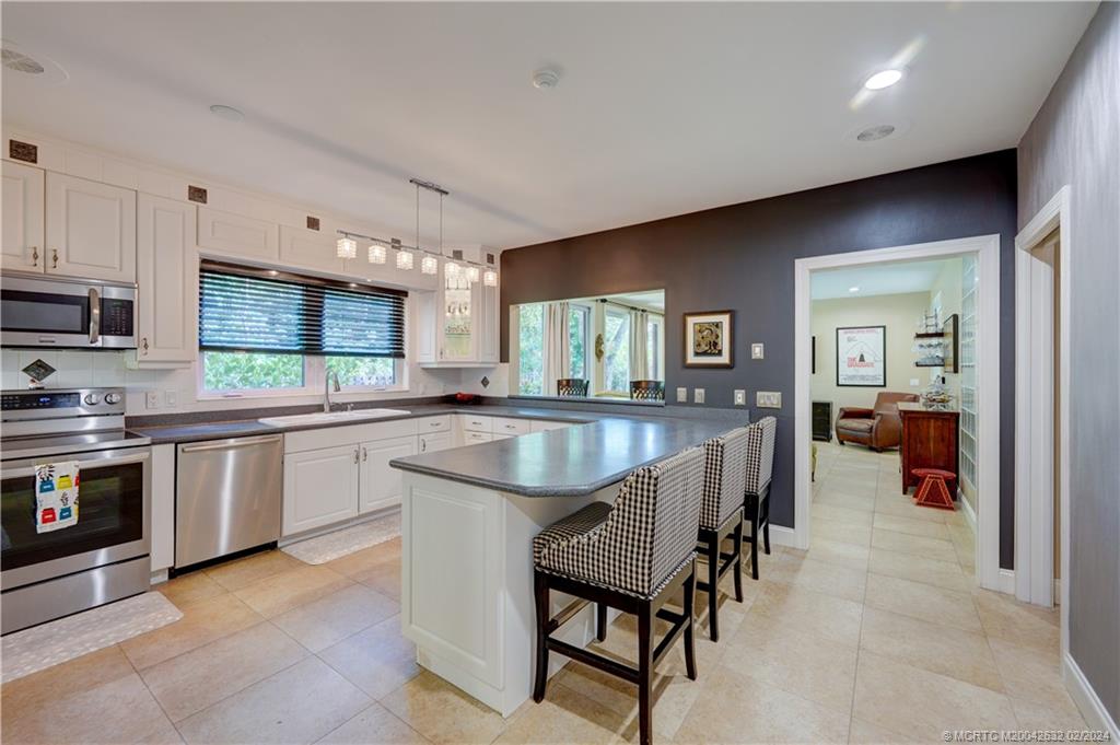 132 South River Road Stuart, FL 34996 - Photo 10 of 45 a very nice looking kitchen with a large window