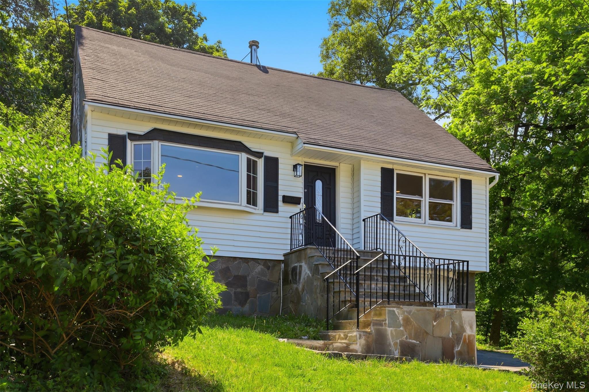24 Fuller Road Ossining, NY 10562 - Photo 2 of 48 front view of house with a yard