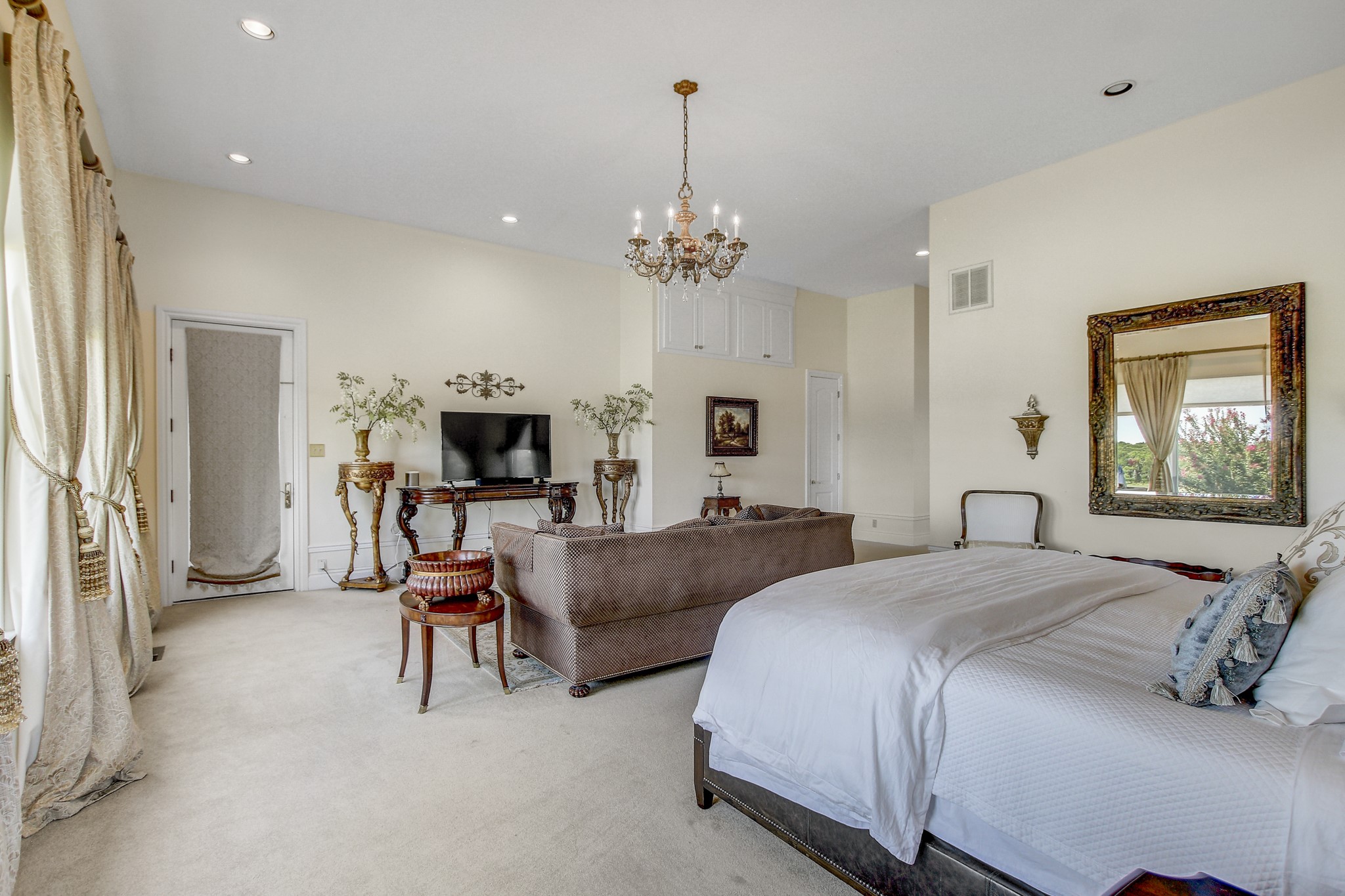 13628 Gregg Manor Road Manor, TX 78653 - Photo 20 of 33 a spacious bedroom with two beds and a window