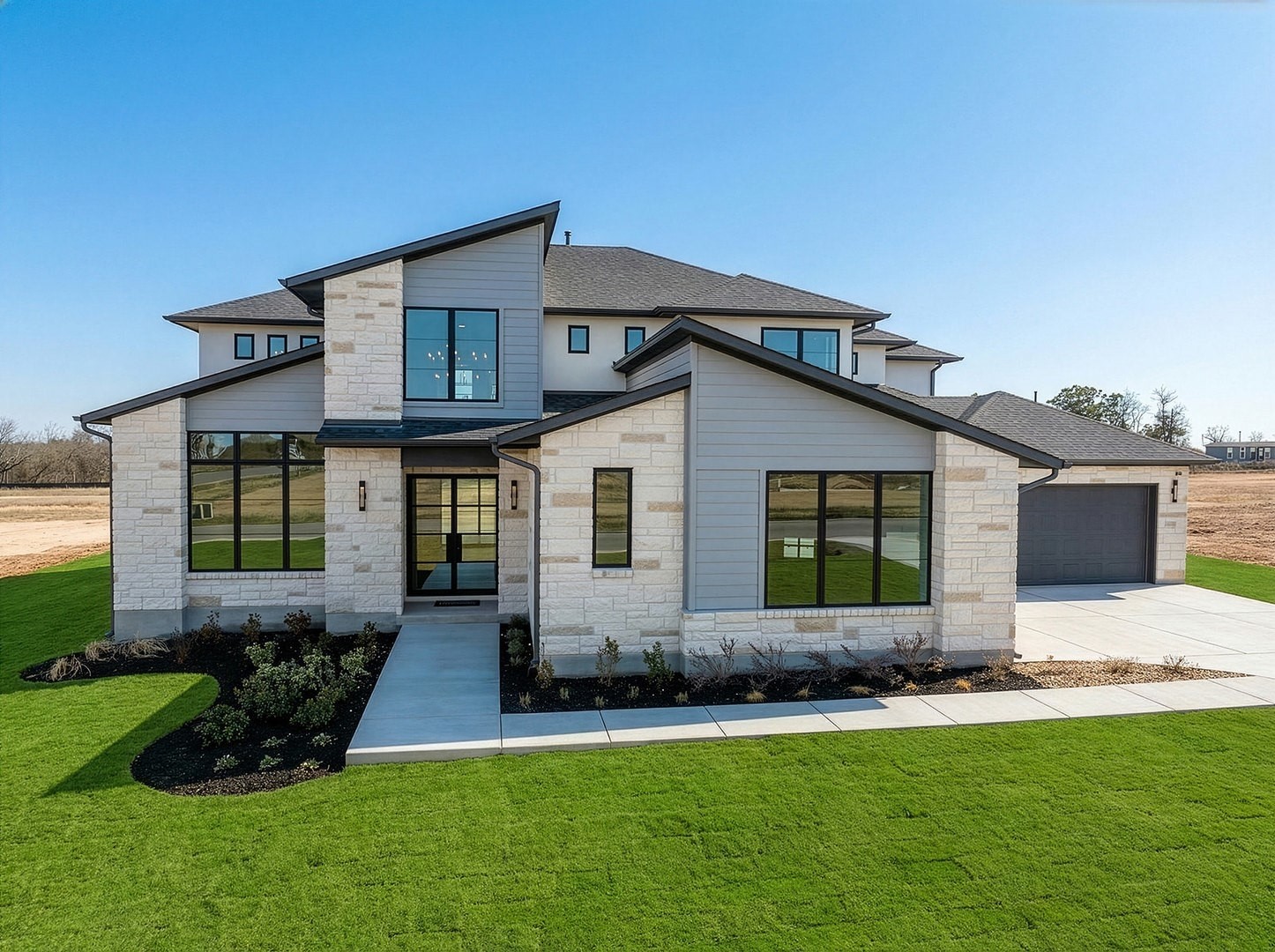 a front view of a house with a yard and porch