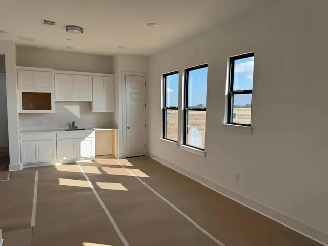a living room with a couch and a table