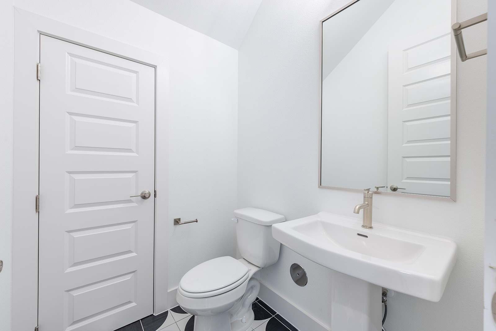 2385 Lineage Lane Leander, TX 78641 - Photo 18 of 36 a bathroom with a sink a toilet and mirror