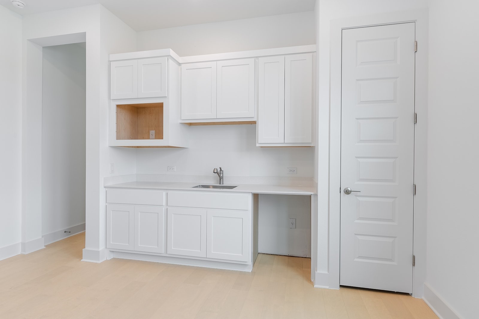2385 Lineage Lane Leander, TX 78641 - Photo 26 of 36 a kitchen with white cabinets and a sink
