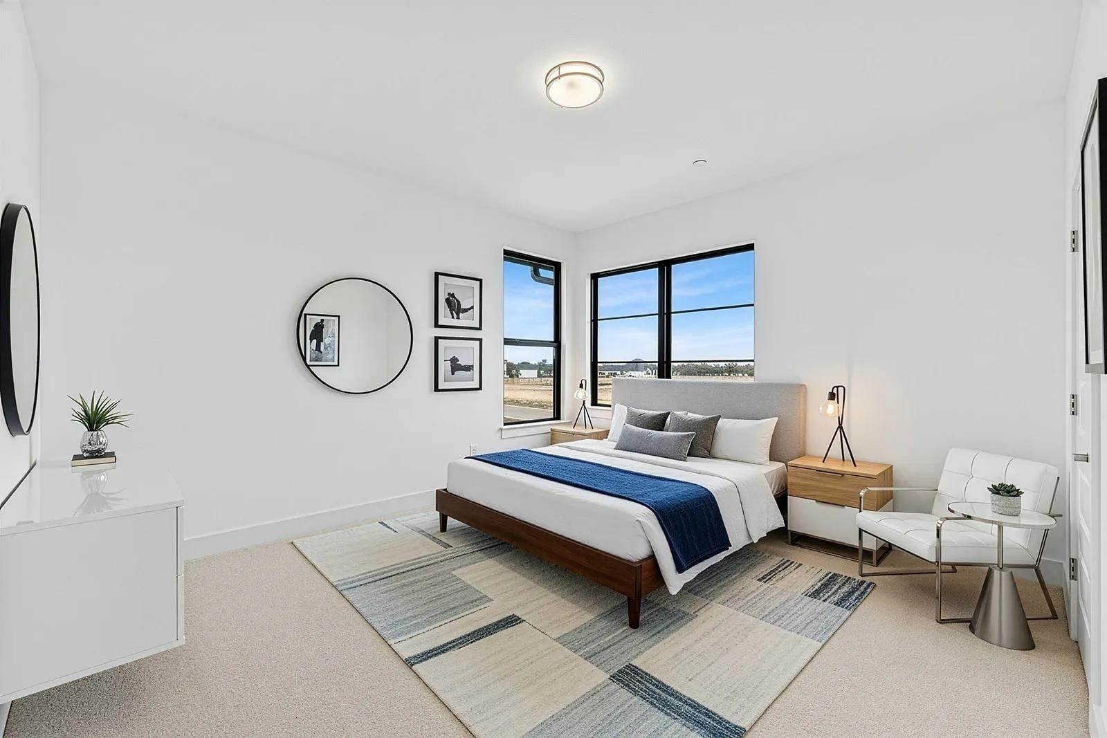 2385 Lineage Lane Leander, TX 78641 - Photo 4 of 36 a bedroom with a bed a mirror and a window