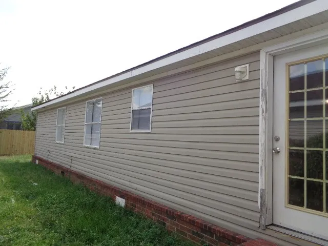 a view of a backyard of a house