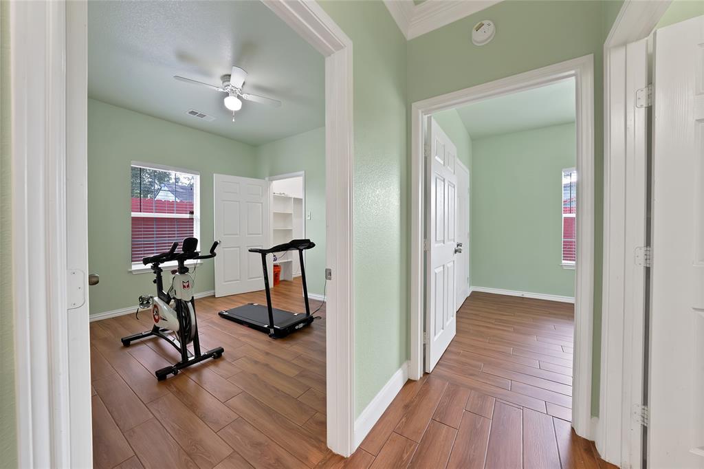 2410 Carleta Street Dallas, TX 75253 - Photo 14 of 29 a view of a room with gym equipment
