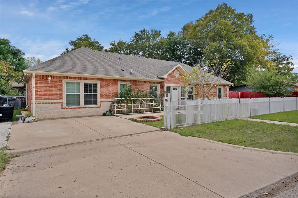 2410 Carleta Street Dallas, TX 75253 - Photo 2 of 29 front view of a house with a yard