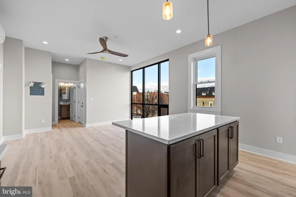 a very nice looking dining room with wooden floor