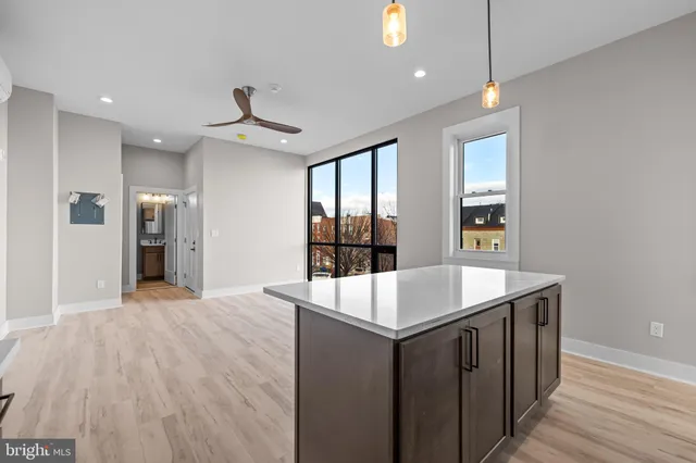 a very nice looking dining room with wooden floor