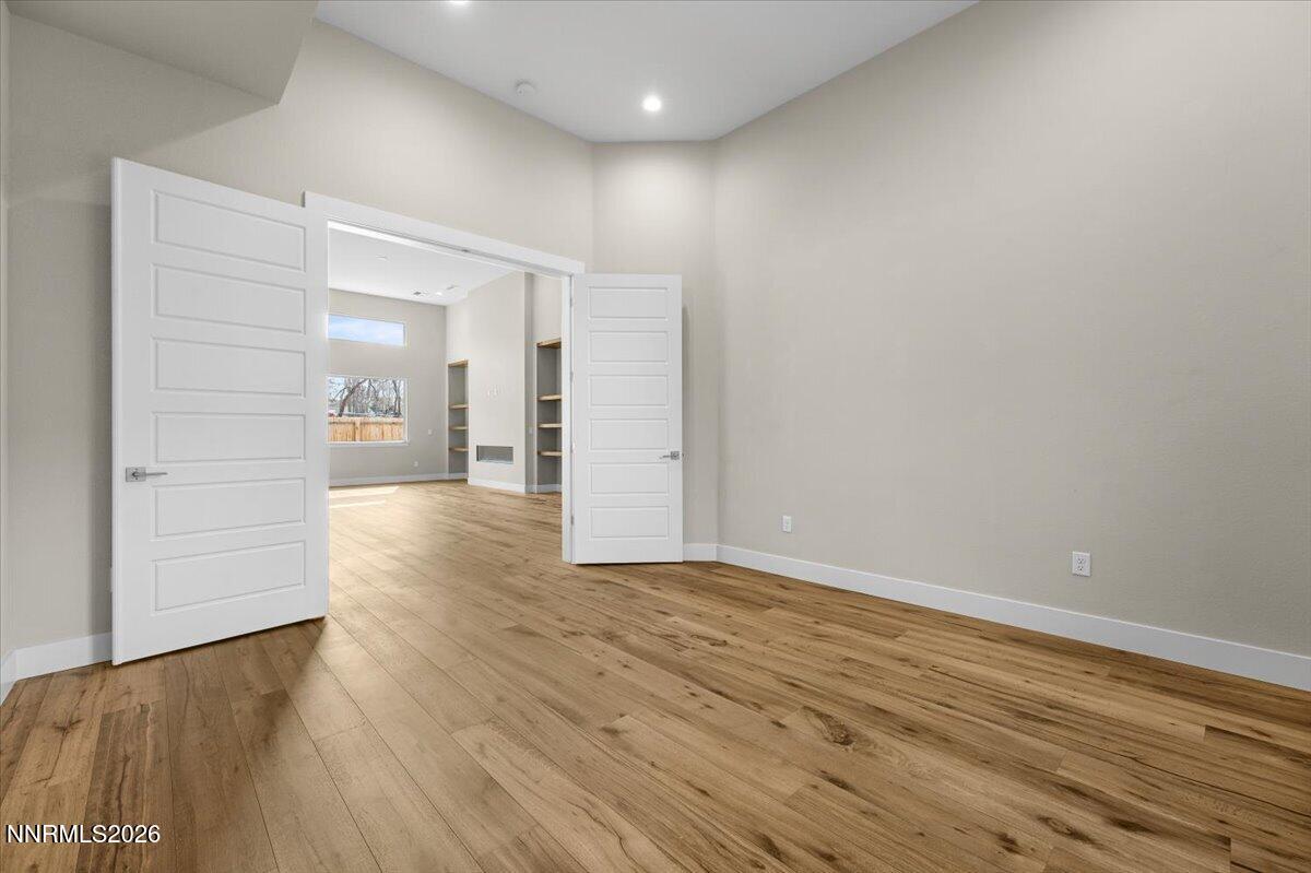 2982 Saddle Peak Drive Reno, NV 89521 - Photo 48 of 98 wooden floor in an empty room with wooden floor