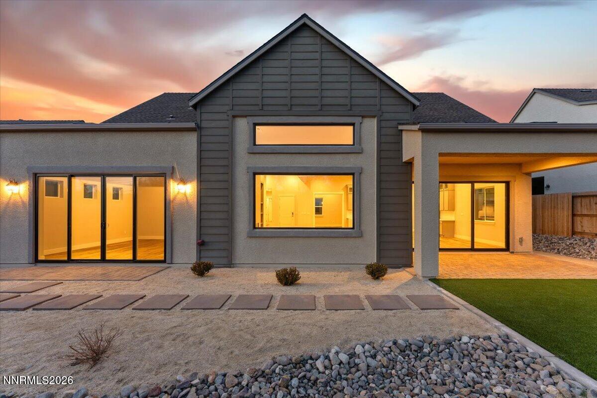 2982 Saddle Peak Drive Reno, NV 89521 - Photo 5 of 98 a front view of a house with a yard