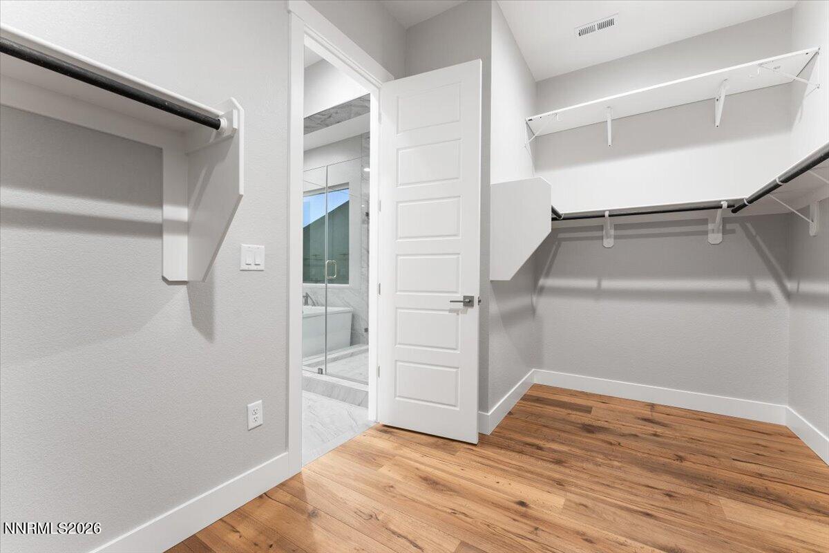 2982 Saddle Peak Drive Reno, NV 89521 - Photo 57 of 98 a view of walk in closet with empty racks