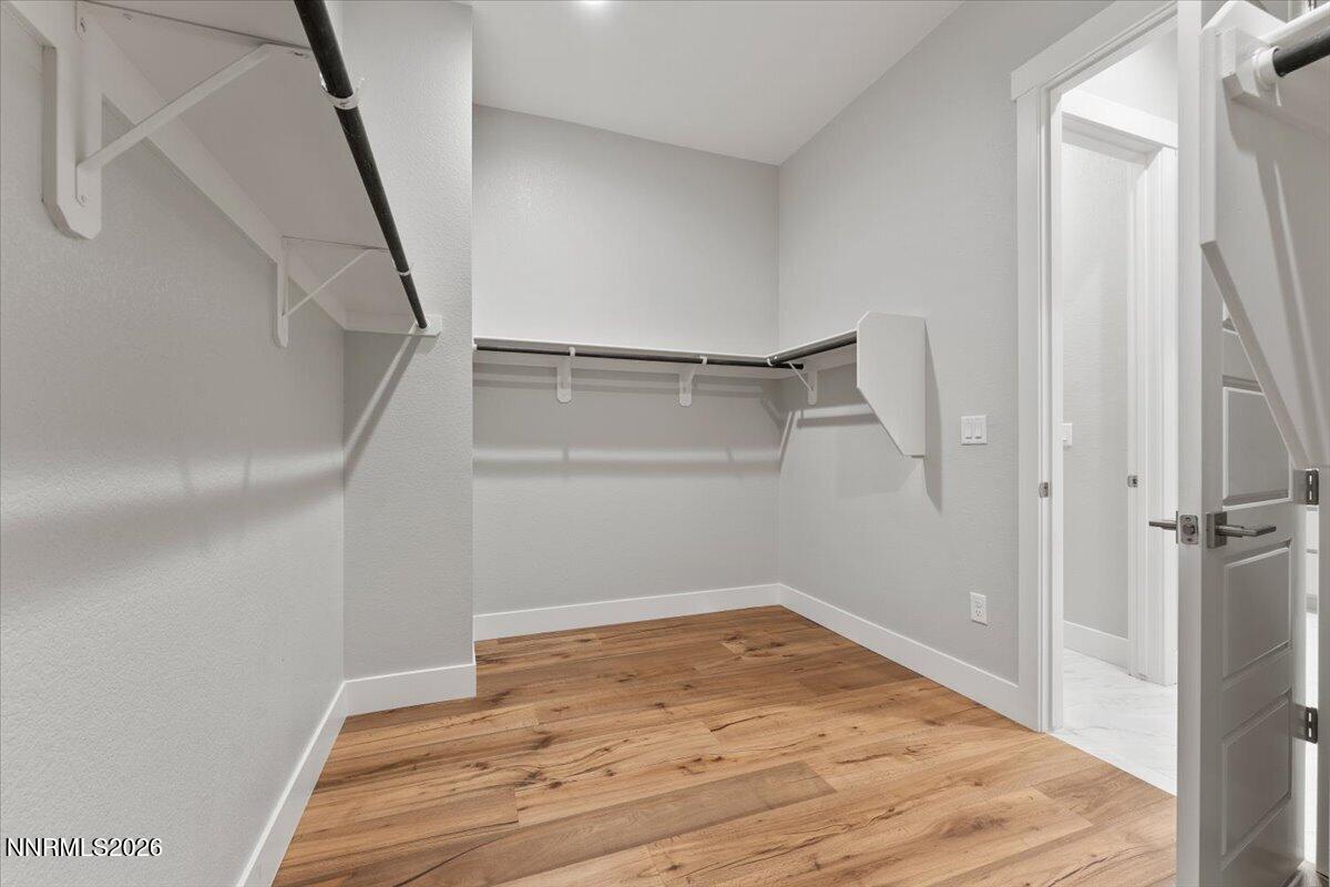 2982 Saddle Peak Drive Reno, NV 89521 - Photo 58 of 98 a view of a room with wooden floor and white walls