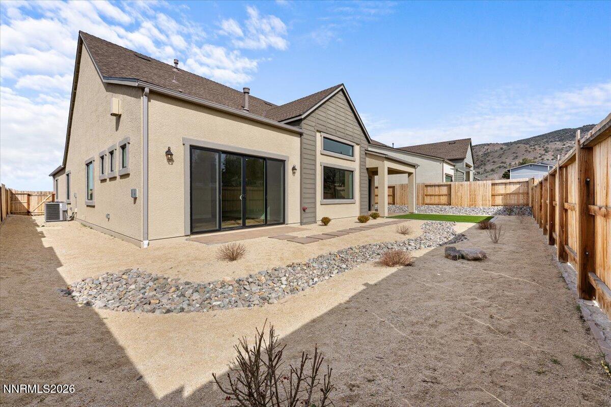 2982 Saddle Peak Drive Reno, NV 89521 - Photo 83 of 98 a front view of a house with a outdoor space