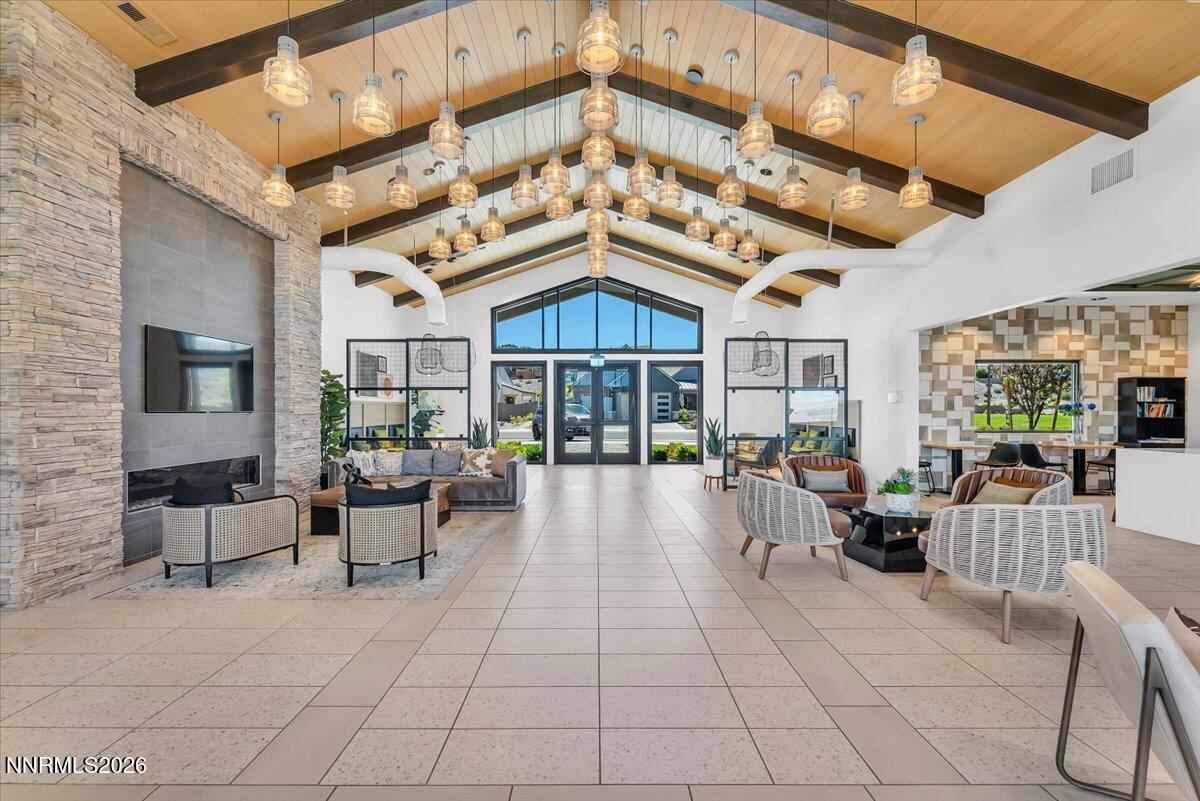 2982 Saddle Peak Drive Reno, NV 89521 - Photo 97 of 98 a view of a patio with dining table and chairs with a barbeque grill and couches