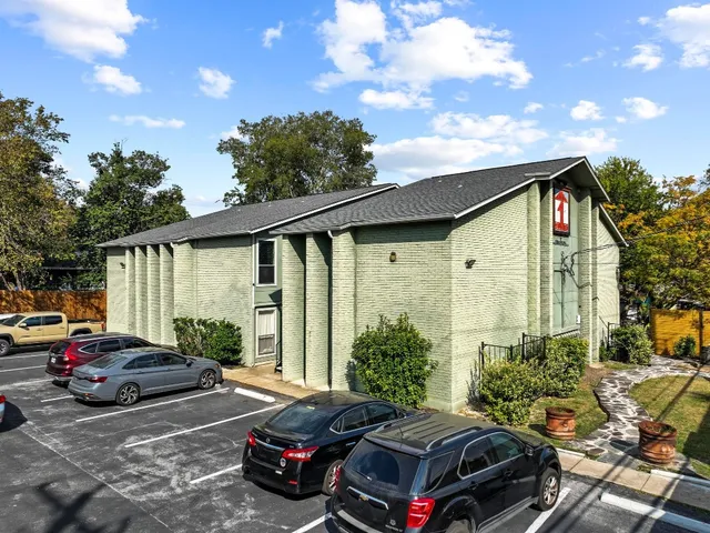 a view of a car in front of house
