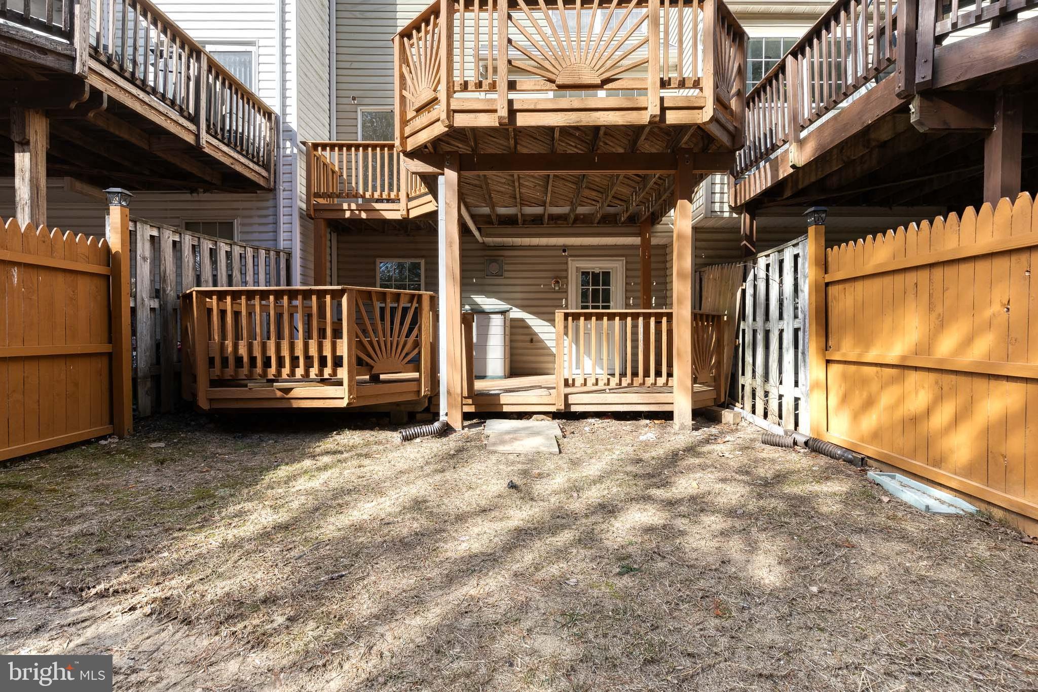 4435 Kentford Road Owings Mills, MD 21117 - Photo 27 of 35 View of both wood deck levels from back of yard