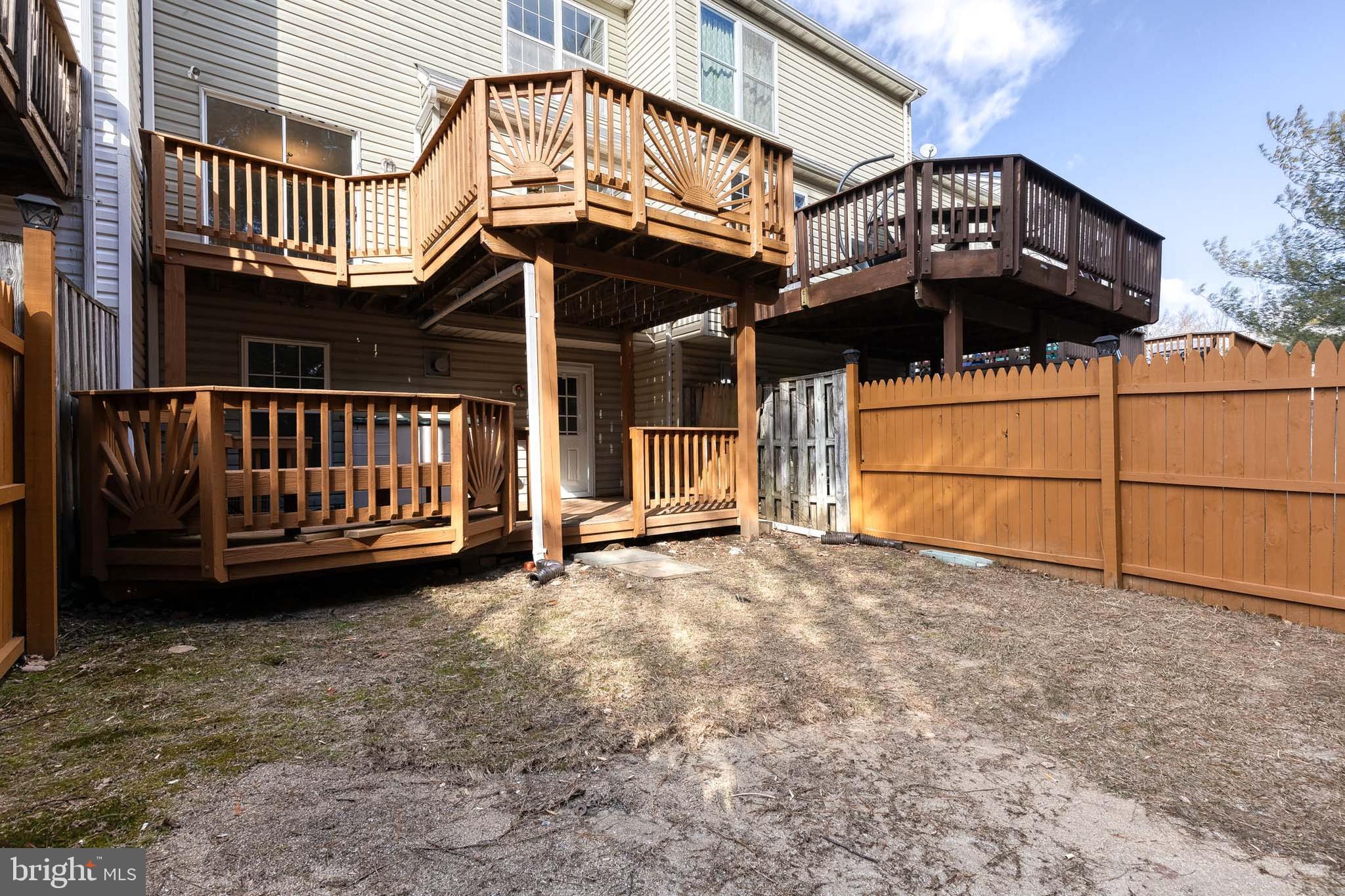 4435 Kentford Road Owings Mills, MD 21117 - Photo 28 of 35 View of both wood deck levels from back of yard