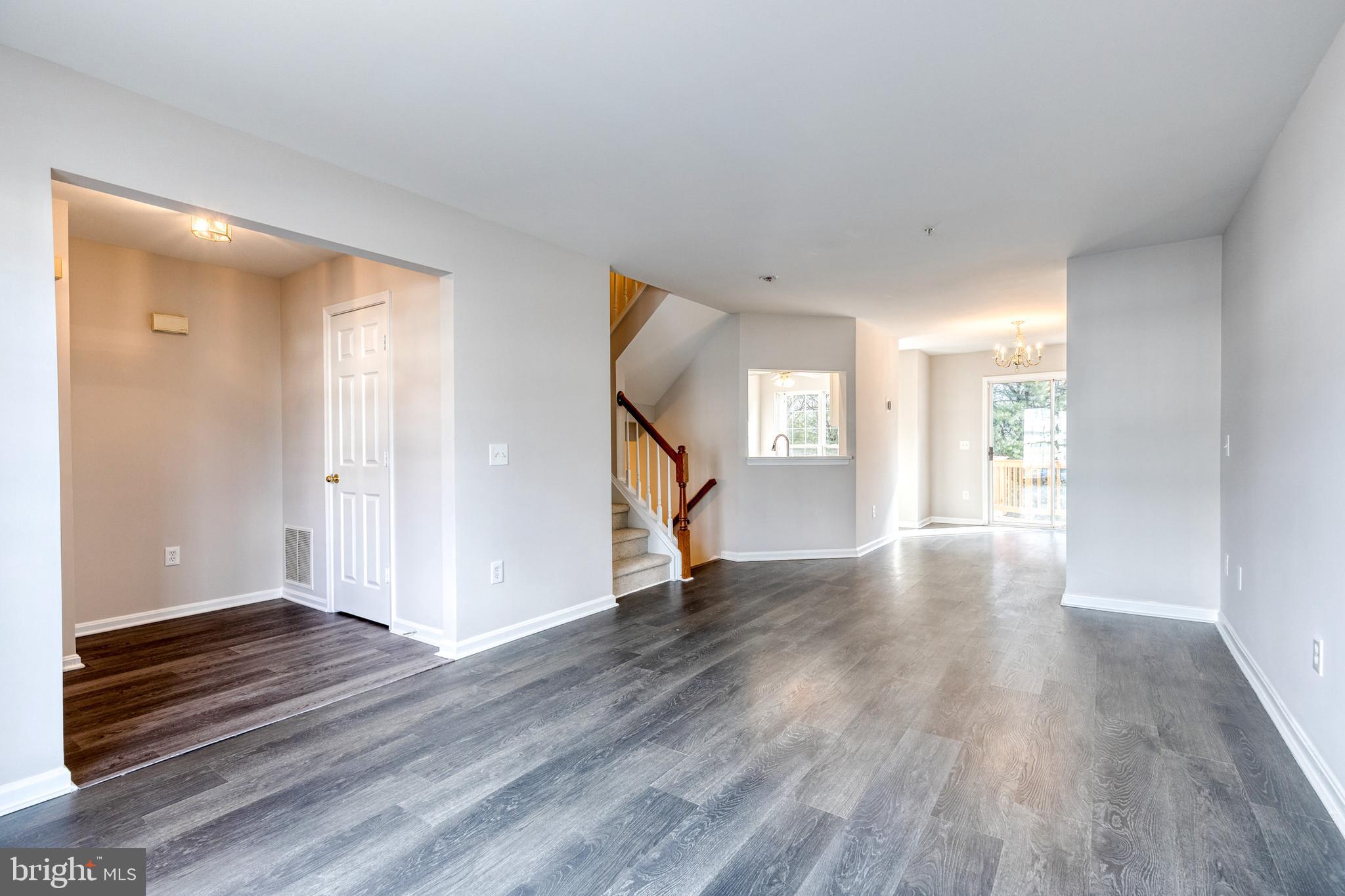 4435 Kentford Road Owings Mills, MD 21117 - Photo 4 of 35 New luxury vinyl floor 1/2 bath/foyer and kitchen