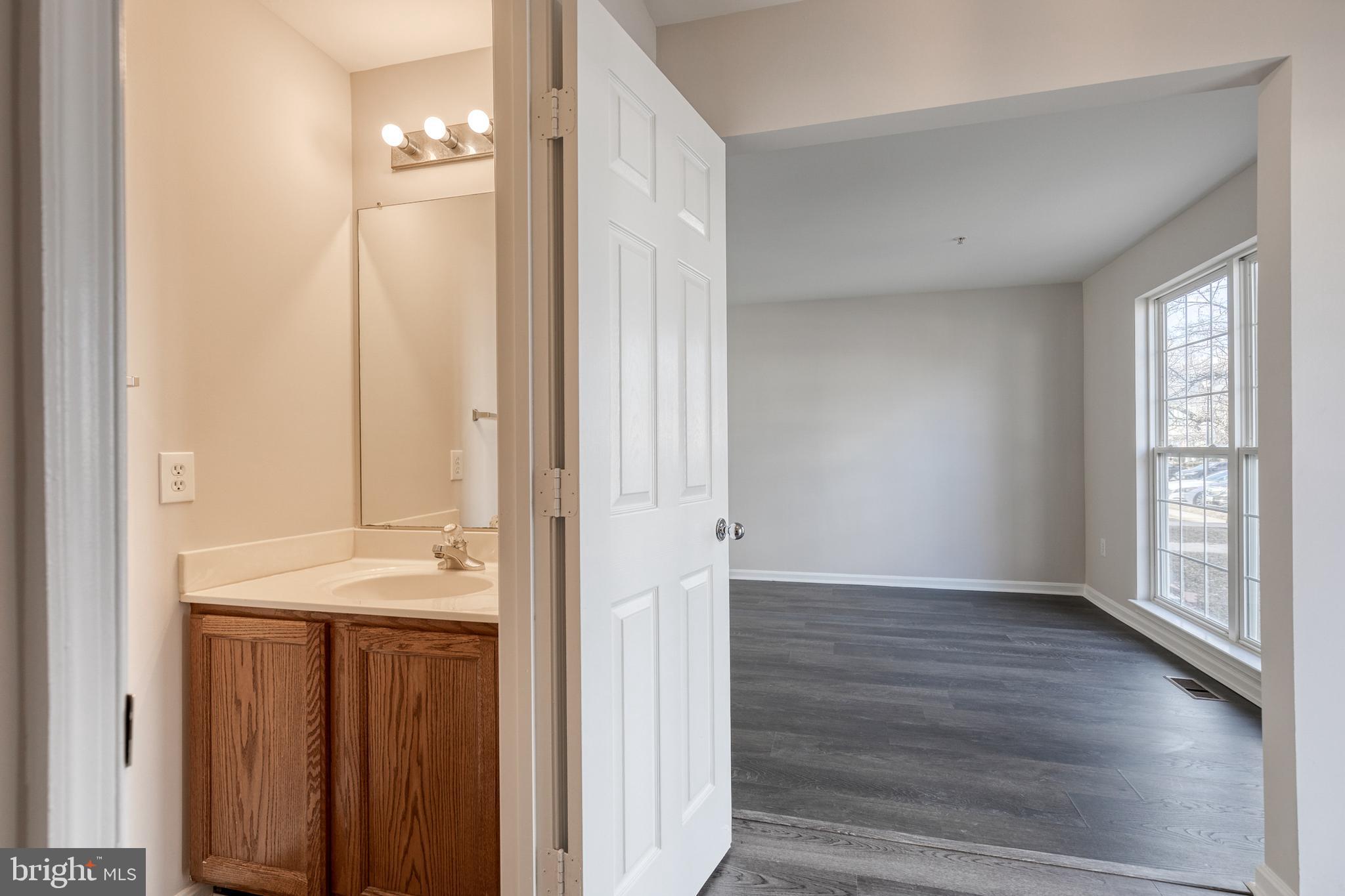 4435 Kentford Road Owings Mills, MD 21117 - Photo 5 of 35 Main floor 1/2 bath w/new paint/flooring