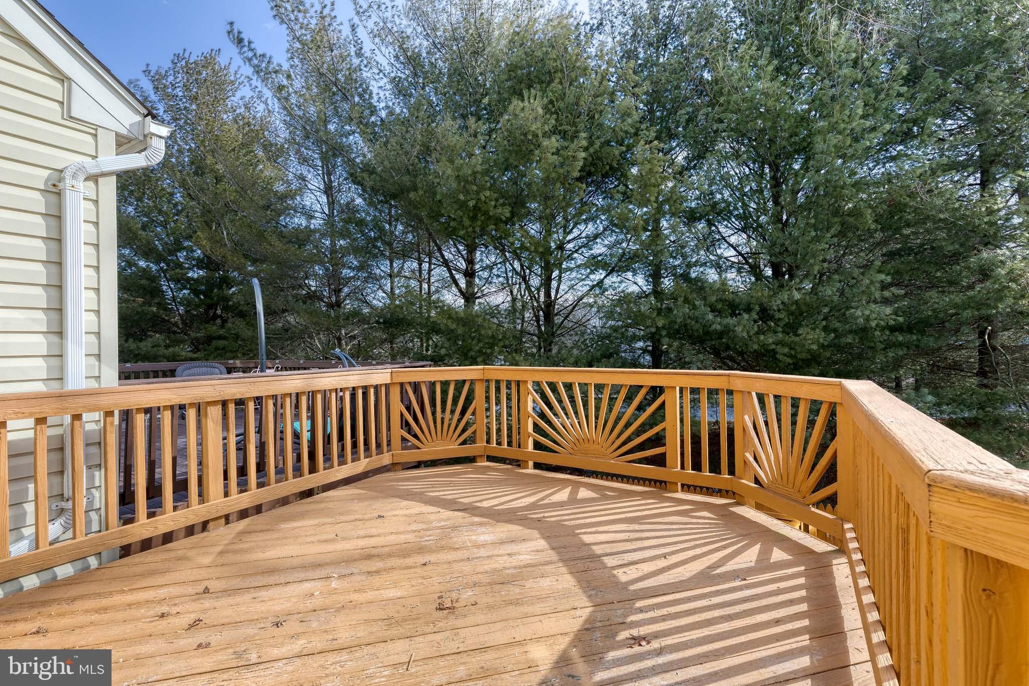 4435 Kentford Road Owings Mills, MD 21117 - Photo 9 of 35 Large wood deck with wood patio underneath
