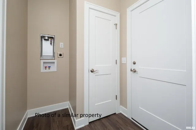 a view of bathroom with a sink and toilet