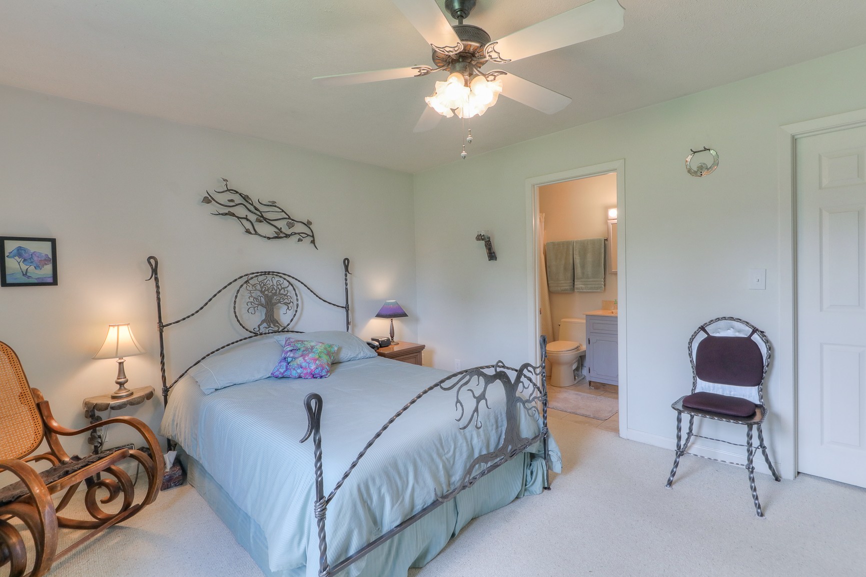 1488 Phillips Road Lebanon, TN 37087 - Photo 22 of 34 a bedroom with a bed and a chair