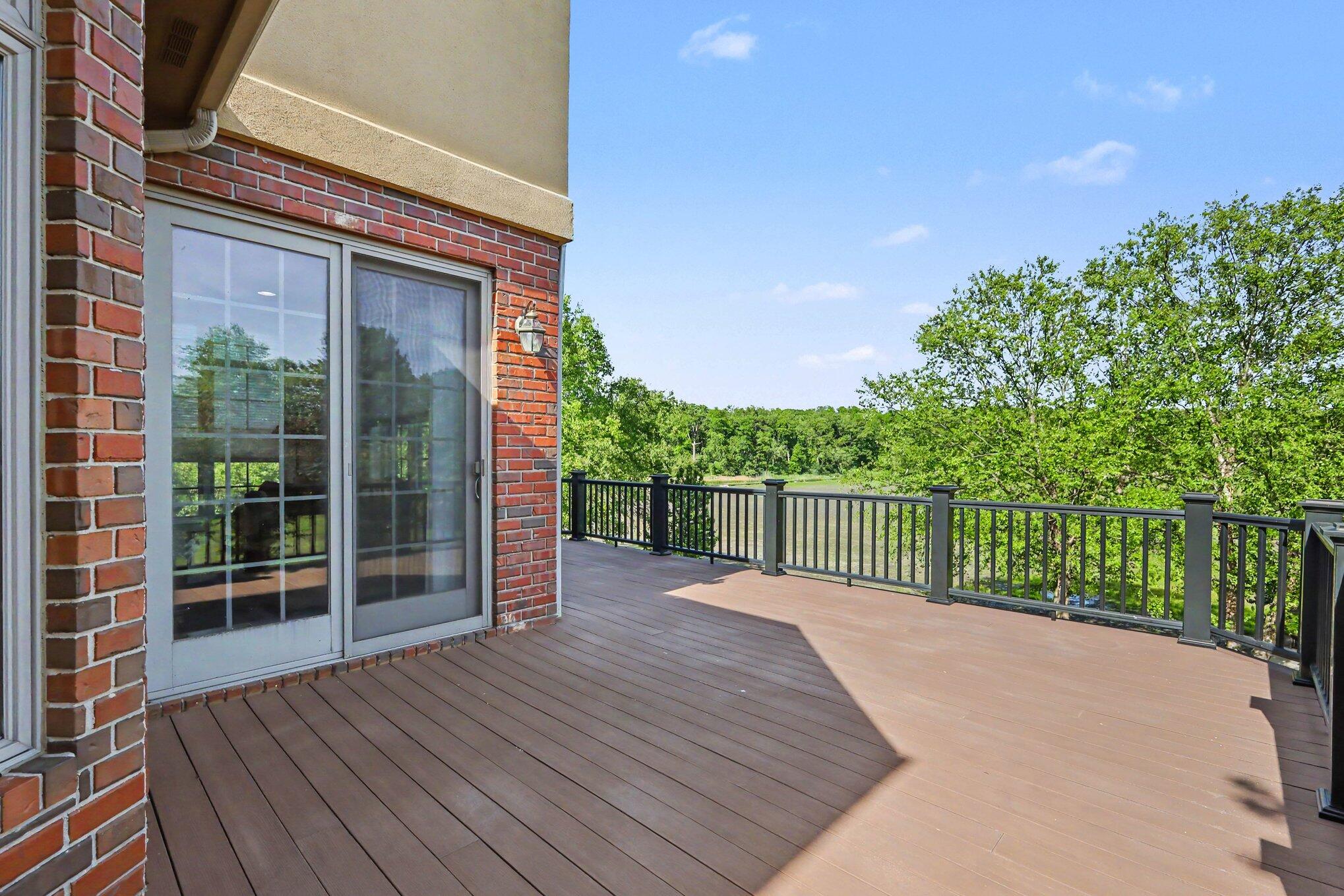 10195 Floyd Street Crown Point, IN 46307 - Photo 19 of 20 a balcony with wooden floor