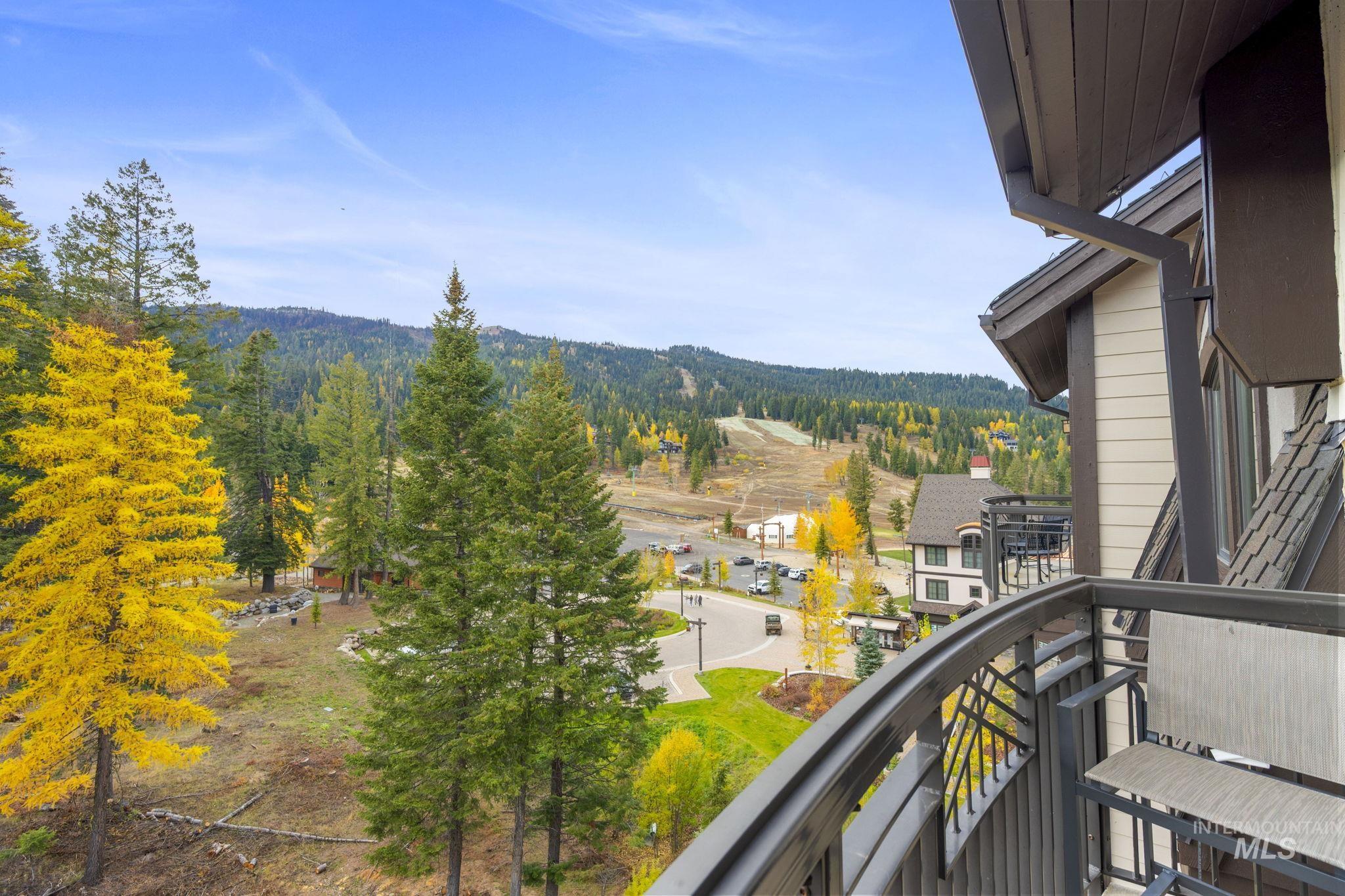 780 Village Drive, Unit 505 Donnelly, ID 83615 - Photo 1 of 33 Balcony featuring a forest view