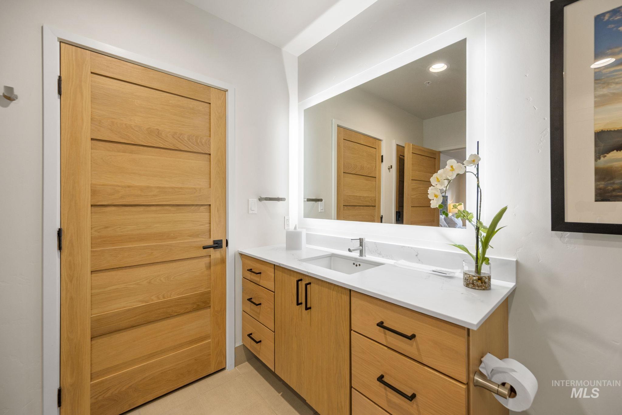 780 Village Drive, Unit 505 Donnelly, ID 83615 - Photo 21 of 33 Bathroom with vanity and light tile patterned floors