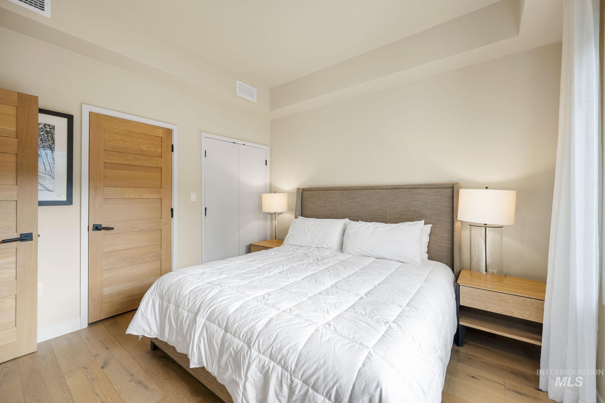 780 Village Drive, Unit 505 Donnelly, ID 83615 - Photo 23 of 33 Bedroom with hardwood / wood-style flooring and a closet