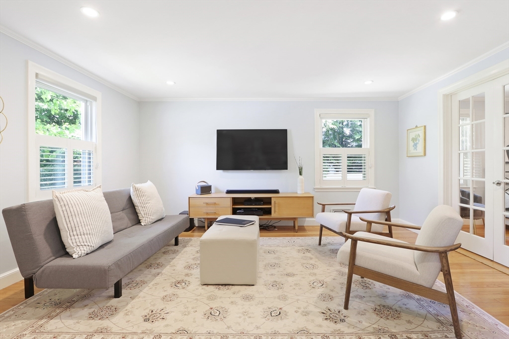 66 Avalon Road Needham, MA 02492 - Photo 12 of 39 a living room with furniture and a flat screen tv