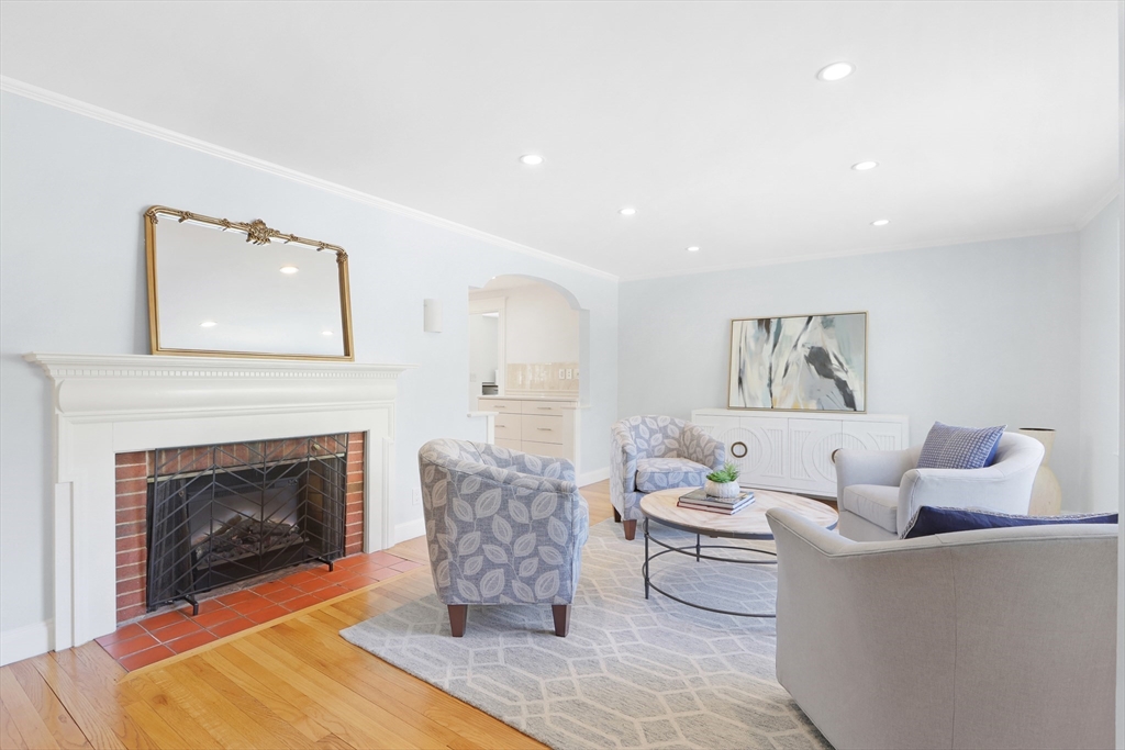 66 Avalon Road Needham, MA 02492 - Photo 14 of 39 a living room with furniture and a fireplace