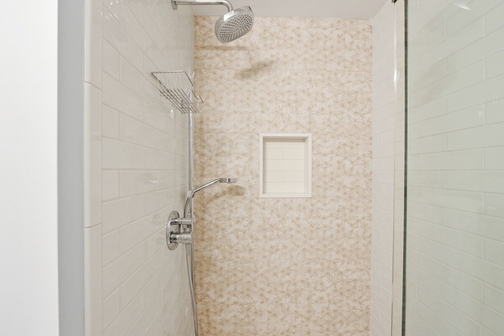 66 Avalon Road Needham, MA 02492 - Photo 16 of 39 a bathroom with a shower