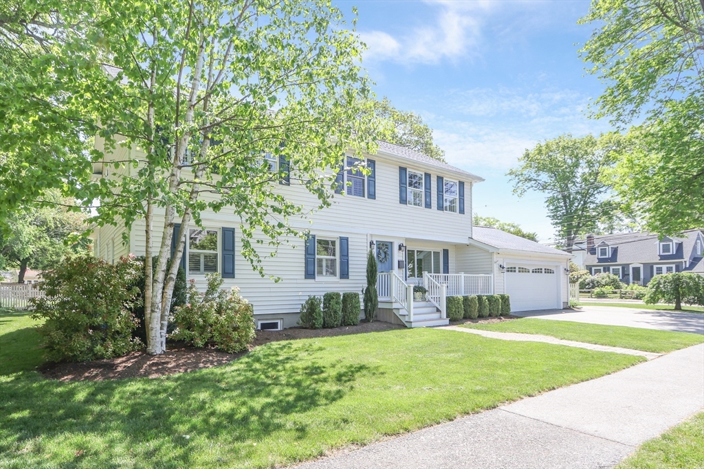 66 Avalon Road Needham, MA 02492 - Photo 2 of 39 a front view of a house with garden