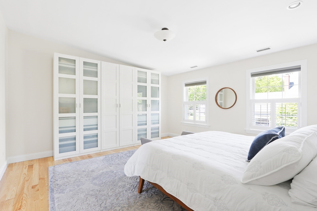 66 Avalon Road Needham, MA 02492 - Photo 23 of 39 a bedroom with a large bed and closet