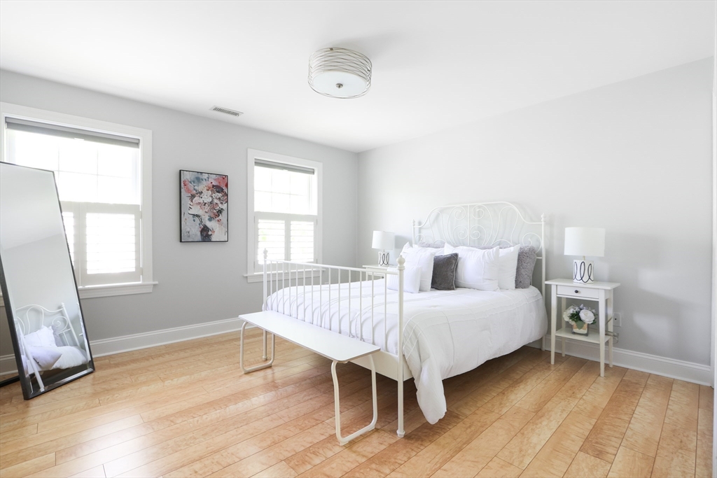 66 Avalon Road Needham, MA 02492 - Photo 27 of 39 a bedroom with a bed and a window