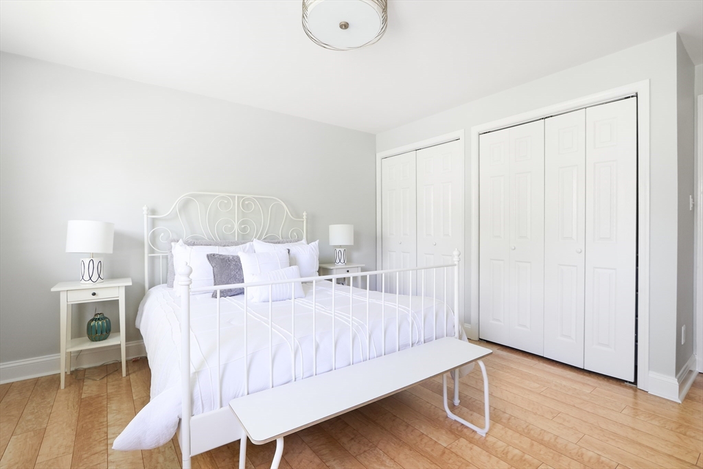 66 Avalon Road Needham, MA 02492 - Photo 28 of 39 a large white bed in a white room