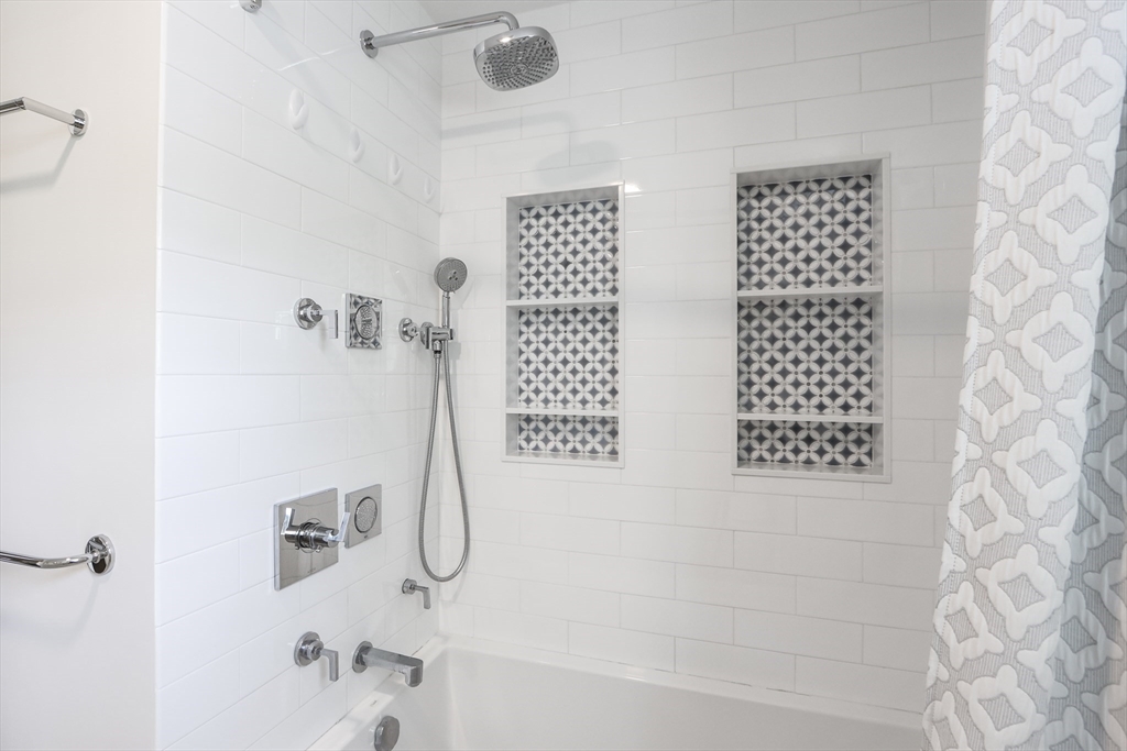 66 Avalon Road Needham, MA 02492 - Photo 32 of 39 a bathroom with a bathtub