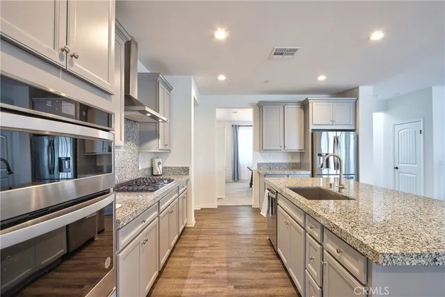 a bathroom with a tub and a ceiling fan