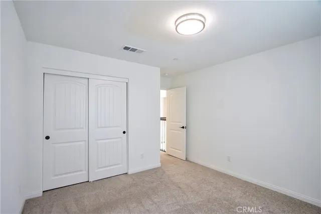 a bathroom with a granite countertop sink mirror and double