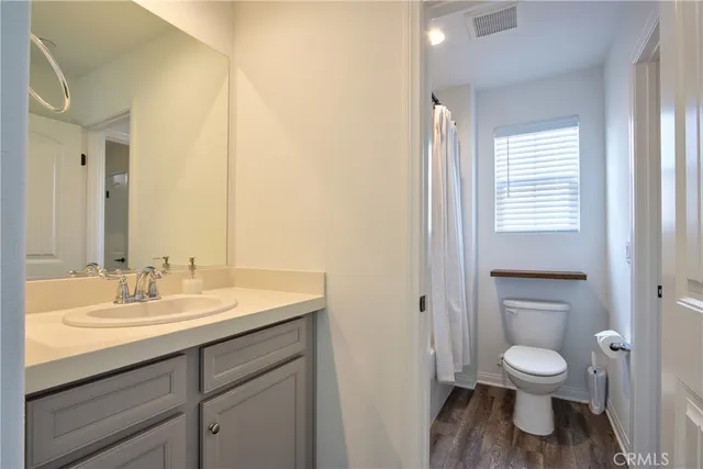 a view of a porch with chairs and backyard