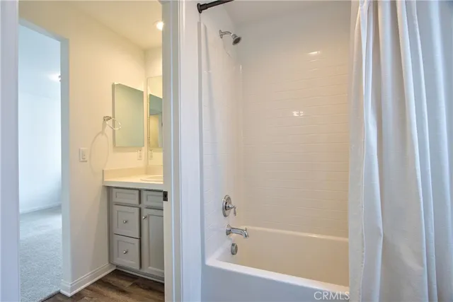 a view of a house with backyard and porch