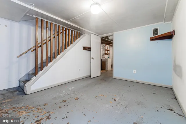 a view of a hallway with staircase