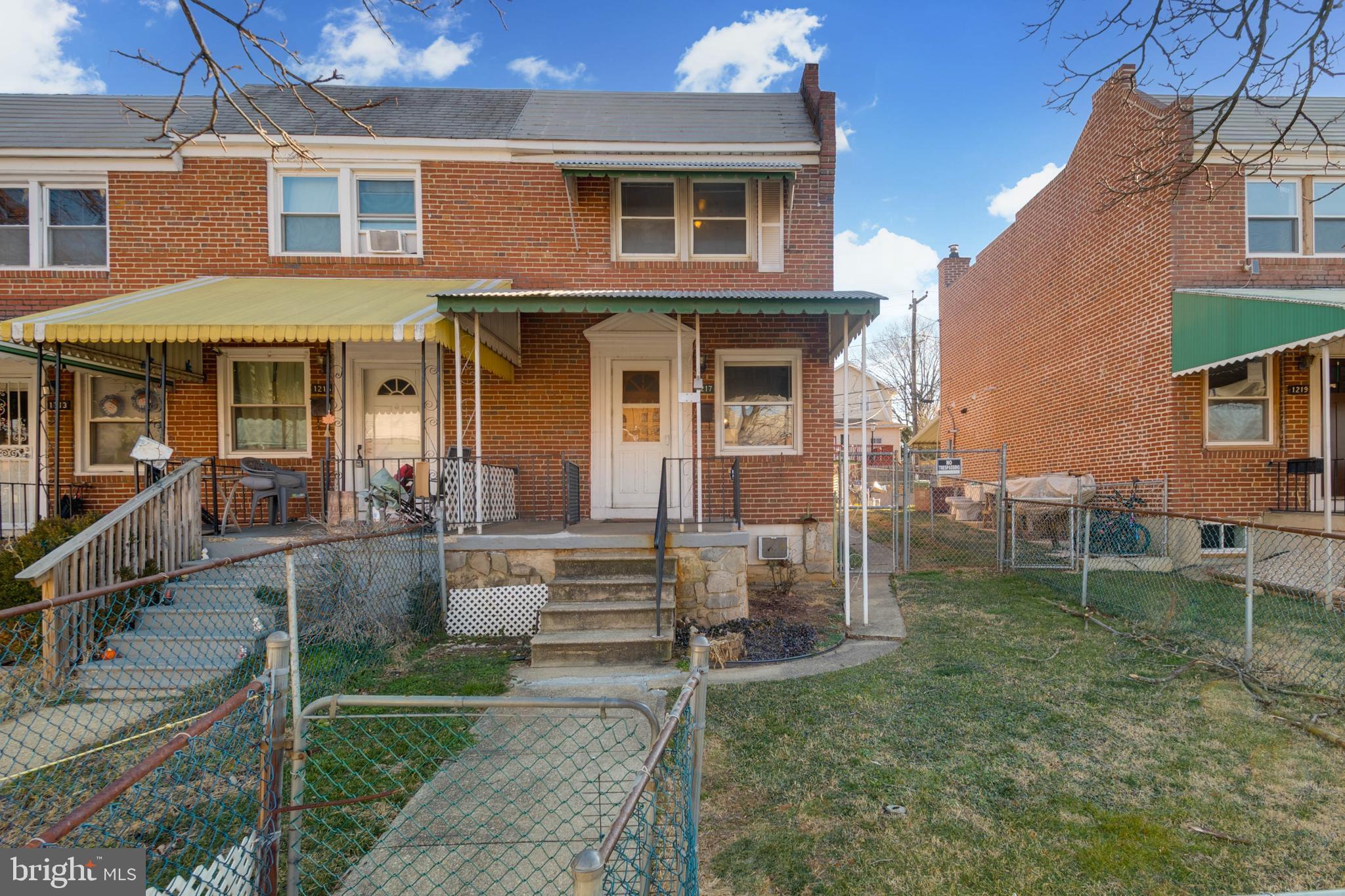 1217 Anglesea Street Baltimore, MD 21224 - Photo 2 of 25 a view of a house with backyard and sitting area