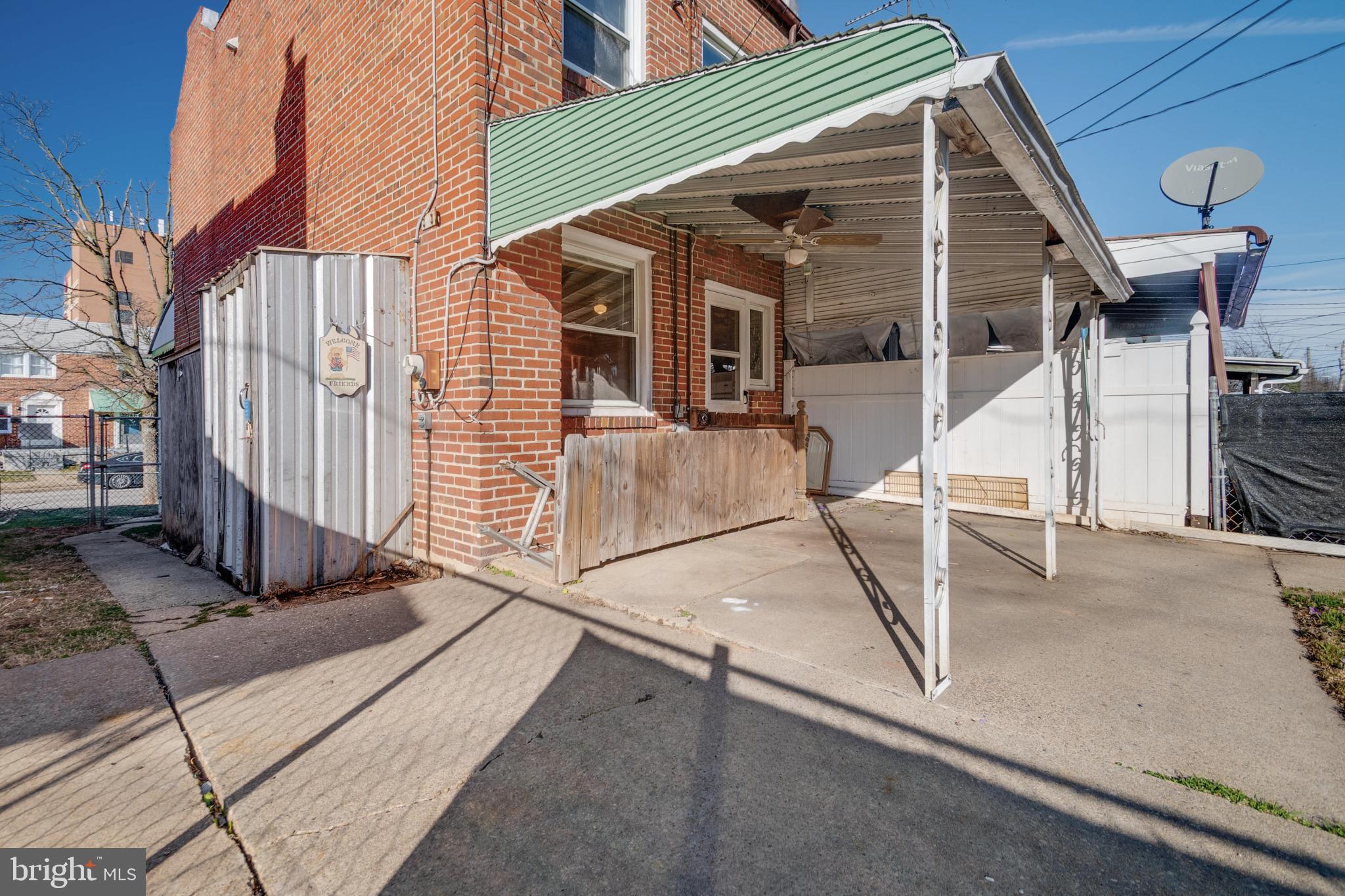 1217 Anglesea Street Baltimore, MD 21224 - Photo 23 of 25 a view of a house with backyard and porch