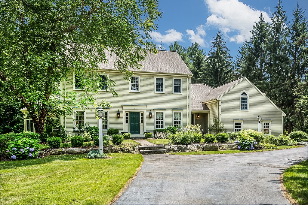 12 Dana Road Boxford, MA 01921 - Photo 1 of 26 a front view of a house with a yard