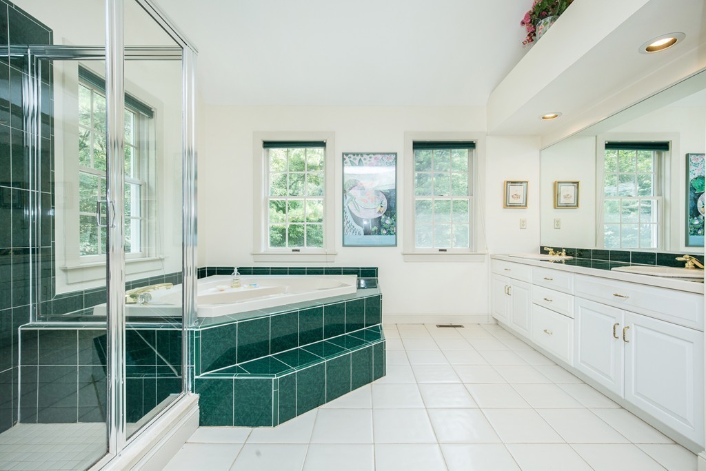 12 Dana Road Boxford, MA 01921 - Photo 18 of 26 a spacious bathroom with a granite countertop sink and mirror