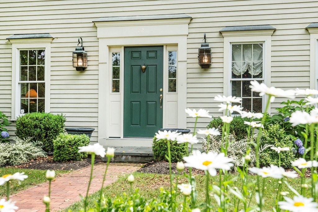12 Dana Road Boxford, MA 01921 - Photo 2 of 26 a front view of a house with a yard