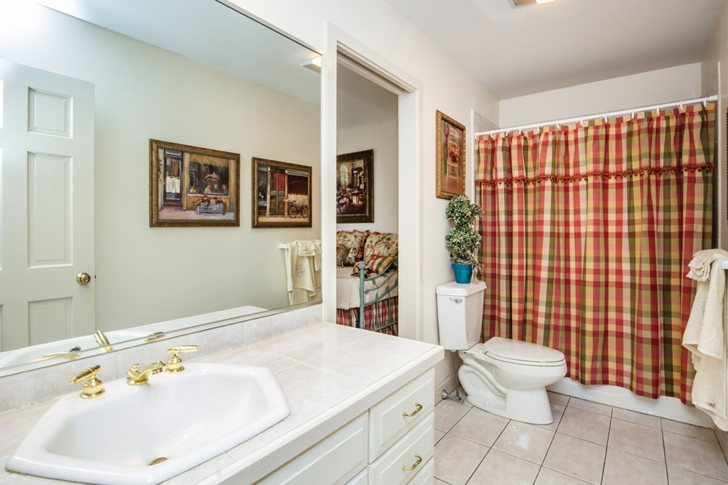 12 Dana Road Boxford, MA 01921 - Photo 21 of 26 a bathroom with a sink and a mirror